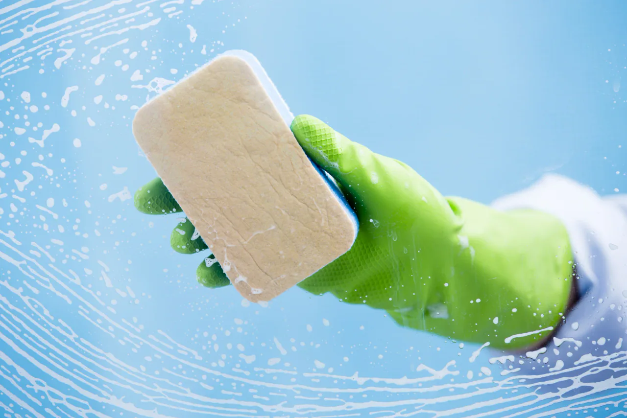 Cleaning a window with a cloth