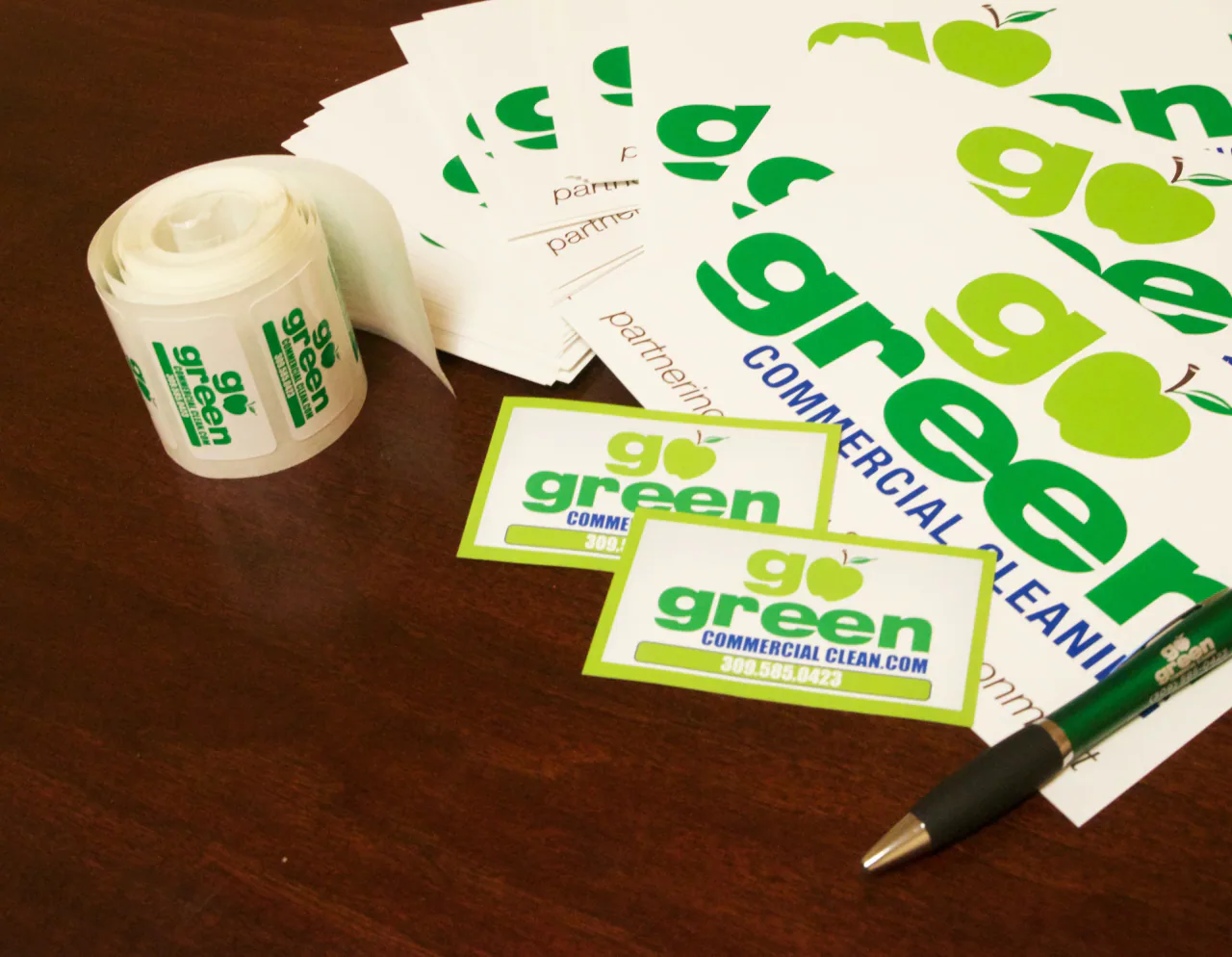 Go Green stickers and branded materials
